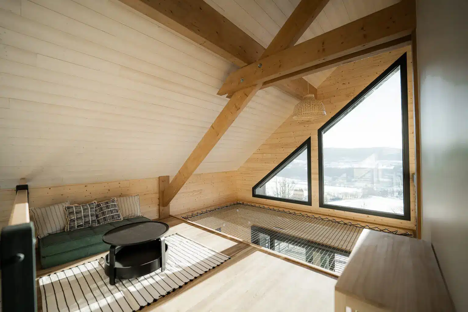 Mezzanine d'un chalet haut-de-gamme à louer dans le Jura